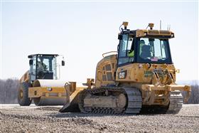 Lehigh Valley Division: A Caterpillar D5K II XL works with a CS56B on a pad. 