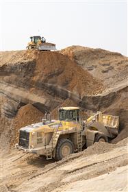 Belvidere Sand & Gravel: A Komatsu WA-600 loader retrieves material in the pit as a Caterpillar D6 pushes material. 