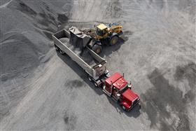 Plumstead Quarry: A Komatsu WA500 loads a customer truck with aggregate at the stockpile. 