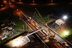 Structures Division: A Structures Division team sets beams over RT22 in Easton, PA. 