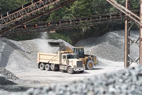 Bedrock Quarry: A Western Star dump truck is loaded with aggregate for delivery to a customer.