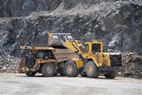 Birdsboro Quarry: A Komatsu WA-800 loads a Caterpillar 777G with shot rock.