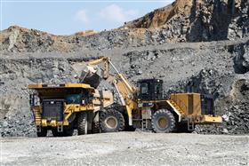 Birdsboro Quarry: A Caterpillar 992K loads a Caterpillar 777G with shot rock.