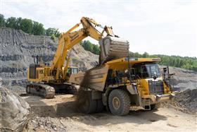 Birdsboro Quarry: A Komatsu PC1250 loads a Komatsu HD506 with overburden.