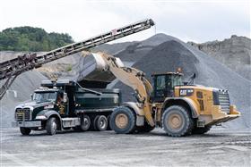 Birdsboro Quarry: A Mack Granite is loaded with stone by a Caterpillar 982M.