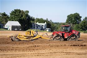 Pottstown Division: A Case IH 580 and Ktec 1228 scraper strip material for a building pad.