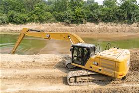Belvidere Sand & Gravel: A Caterpillar 330 long reach excavator cleans silt from retention ponds. 