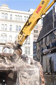Haines & Kibblehouse, Inc.: A Caterpillar 345C works on selective demolition on Jeweler's Row in Philadelphia. 