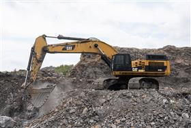 Pottsville Quarry & Asphalt: A Caterpillar 390D works the pit.