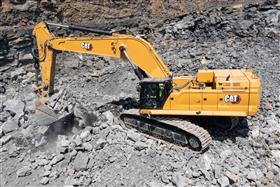 Pottsville Quarry & Asphalt: A Caterpillar 395 works with material in the pit. 