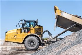 Hazleton Quarry & Eckley Asphalt: A Caterpillar 745 dumps rock into the primary crusher. 