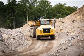 Hazleton Quarry & Eckley Asphalt: A Caterpillar 745 heads to the pit to get loaded with shot rock.