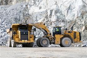 Penn/MD Quarry: A Caterpillar 772G haul truck is loaded with shot rock by a Caterpillar 988K loader. 