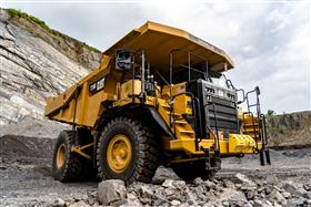 Douglassville Quarry: A Caterpillar 775G gets loaded with shot rock down in the pit. 
