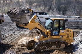 Lehigh Valley Division: A Caterpillar 963 loads an articulated dump truck with material on a site in Easton, PA. 