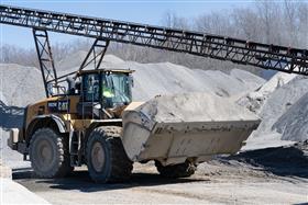 Silver Hill Quarry: A Caterpillar 982M moves aggregate to stockpiles.