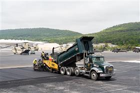 Harrisburg Division: Paving the Muir Army Airfield. The attached image does not imply DoD endorsement of or express a DoD opinion about a product, service, company or organization, or objective.