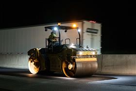 Haines & Kibblehouse, Inc.: A Caterpillar asphalt roller rolls top coat on I-76. 