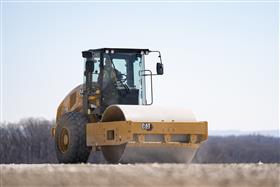 Lehigh Valley Division: A Caterpillar CS56B roller compacts a pad. 