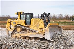 Harrisburg Division: A D8T grades a pad out utilizing crushed stone from the site.