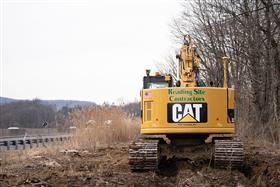 Pottstown Division: A Caterpillar 321D excavates a drainage ditch.