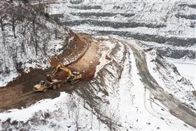 Birdsboro Quarry: A Komatsu PC650 strips overburden and loads it into a Caterpillar 740 rock truck. 