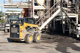 Delaware Valley Asphalt: A Caterpillar skidsteer cleans up the area around the plant. 
