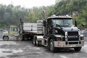 Easton Block & Supply: A Easton Block & Supply truck and trailer are loaded with block for delivery to a customer. 