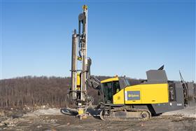 Silver Hill Quarry: A Epiroc D60 drill prepares for a blast at Silver Hill Quarry.