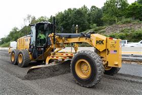 Lehigh Valley Division: A Caterpillar 12M3 grades aggregate in preparation for a new roadway. 