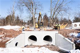 Haines & Kibblehouse, Inc.: A pipe crew sets pipe and precast structures in place. 