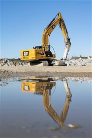 Hawley Quarry: A Caterpillar 336 hammers rock.