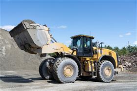 Hawley Quarry: A Caterpillar 980M prepares to load product into a dump truck.