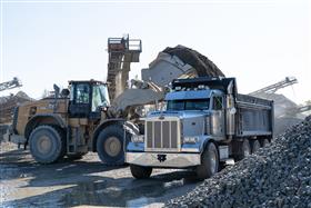 Hawley Quarry: A Caterpillar 980M loads a dump truck with product.