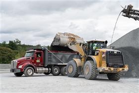 Hilltop Quarry: A Caterpillar 980K loads a dump truck with aggregate.