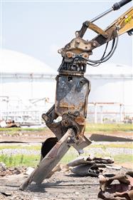 Haines & Kibblehouse, Inc.: A shear on a Caterpillar 349F processes metal at a tank farm demolition job.