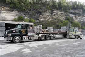 Easton Block & Supply: A Easton Block & Supply truck and trailer are loaded with block for a delivery.