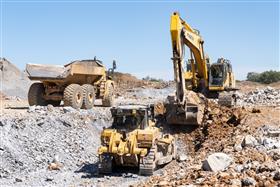 Harrisburg Division: A Caterpillar D6 feeds material to a Komatsu PC650.