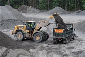 Douglassville Quarry: A Caterpillar 982M loads a dump truck with aggregate.