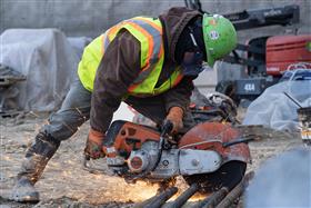 Structures Division: A Structures Division team member cuts anchor bars before installation. 