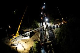 Structures Division: A Structures Division crew prepares to set and install precast bridge beams on Vera Cruz Road. 