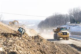 Lehigh Valley Division: Four pieces of Caterpillar equipment work along I78.