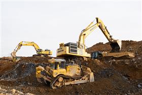 Harrisburg Division: A mix of Caterpillar and Komatsu equipment work a cut on a site in Annville, PA. 