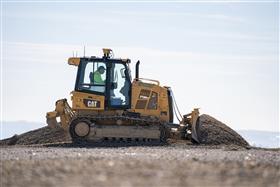 Lehigh Valley Division: A Caterpillar D5KII XL grades material on a pad. 