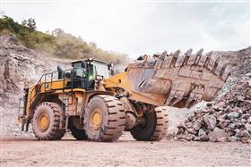 Locust Ridge Quarry & Asphalt: A Caterpillar 988K works the pit floor.