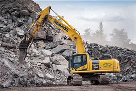 Locust Ridge Quarry & Asphalt: A Komatsu PC360-11 hammers rock in the pit.