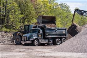 Hazleton Quarry & Eckley Asphalt: A Mack dump truck gets loaded with aggregate.