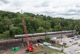 Structures Division: An Amtrak train passes by a Structures Division site in Coatesville, PA. 