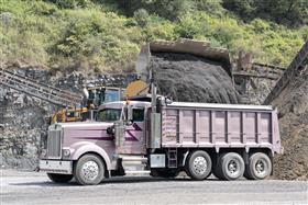 Naceville Quarry: A Kenworth dump truck is loaded with aggregate.