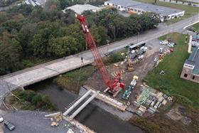 Structures Division: A Structures Division team sets precast concrete beams along SR443 in Lehighton, PA.